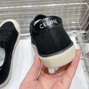 JANE SNEAKERS LOW LACE-UP WITH TRIOMPHE PATCH IN CANVAS AND CALFSKIN BLACK