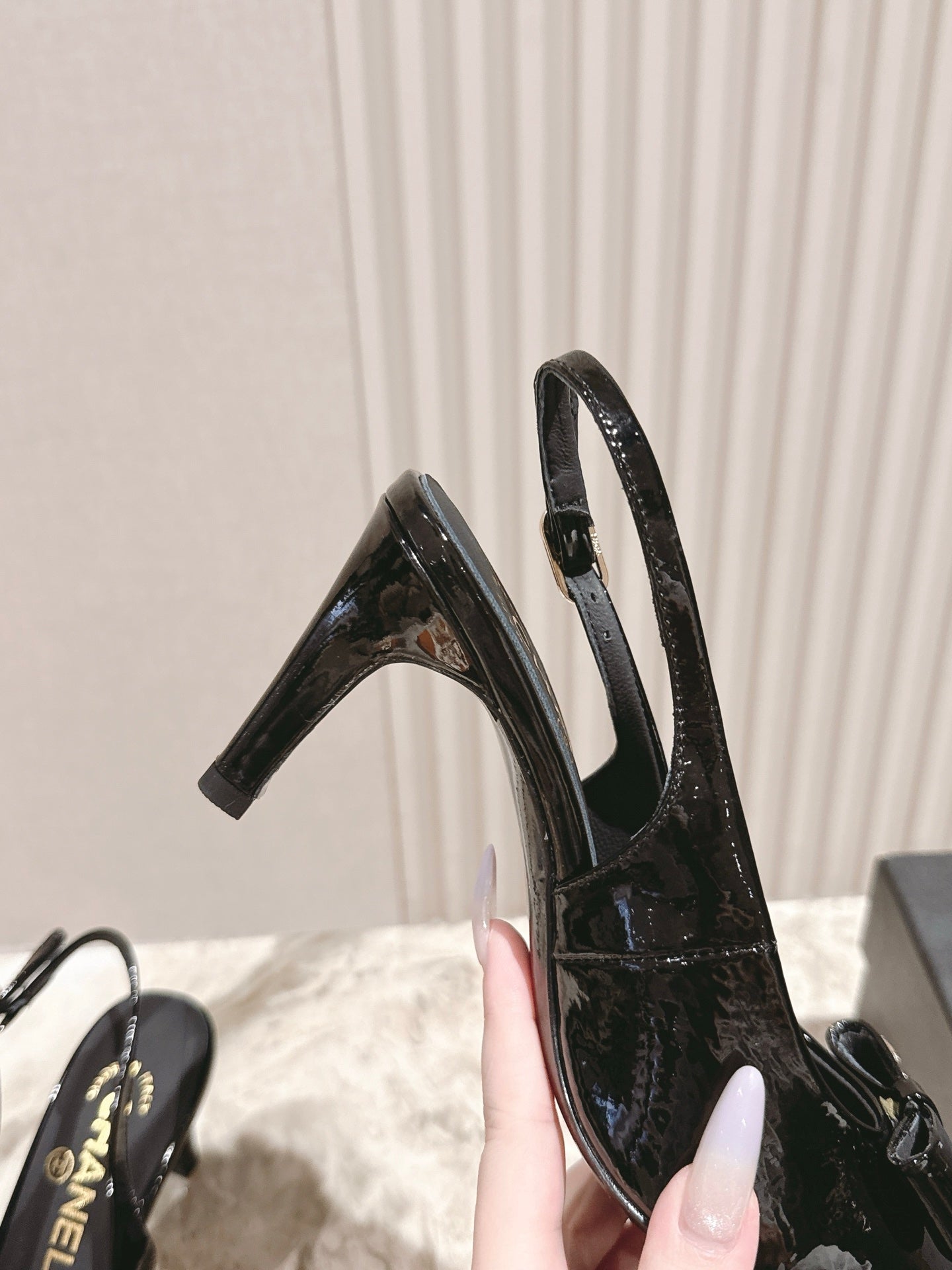CC HIGH SLINGBACK IN BLACK LAMBSKIN WITH BOW ATTACHED