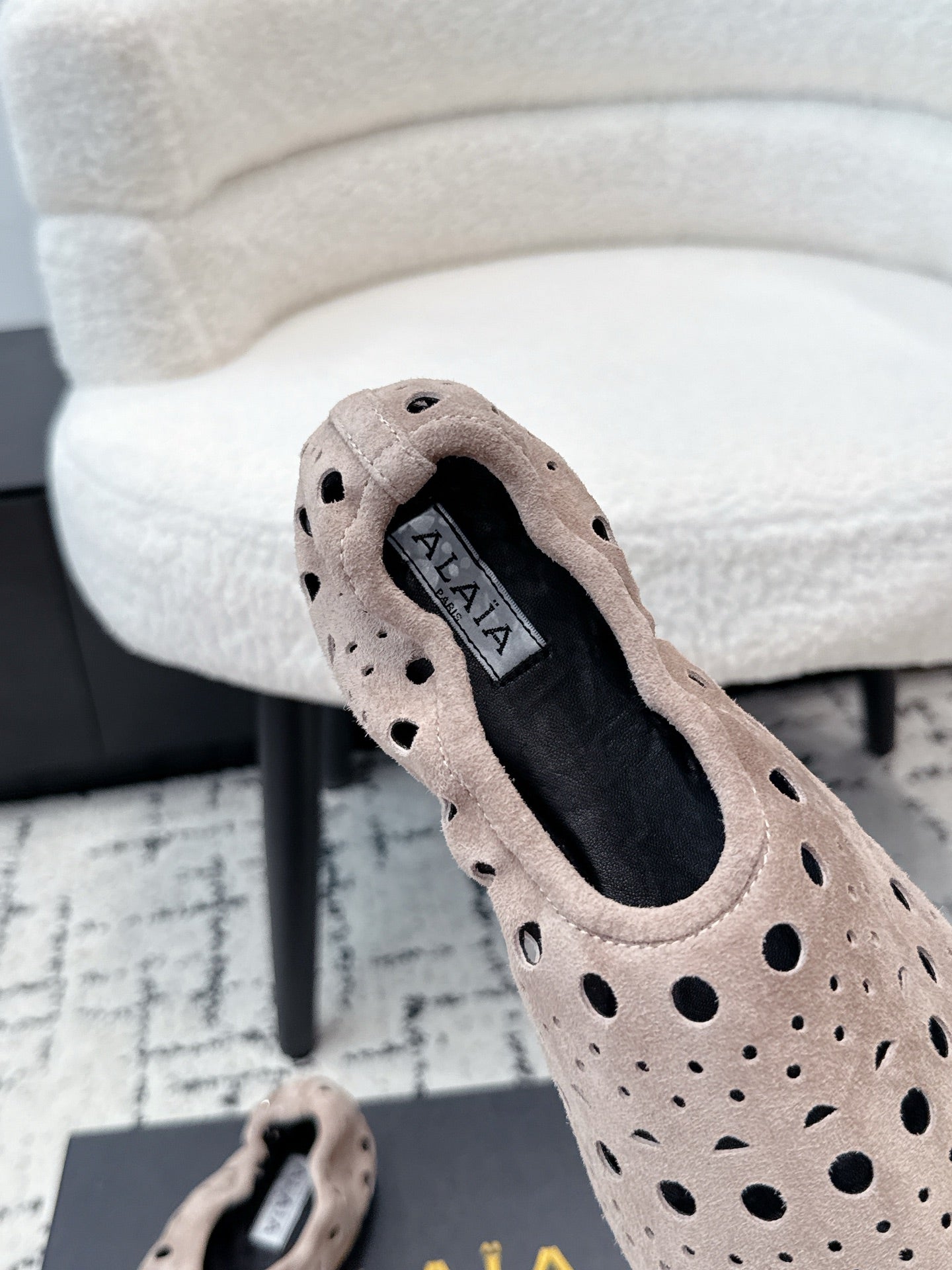 ALAIA 26S FLAT SLIP-ONS IN NUDE PINK SUEDE WITH OPENWORK PATTERN