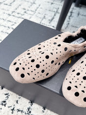 ALAIA 26S FLAT SLIP-ONS IN NUDE PINK SUEDE WITH OPENWORK PATTERN