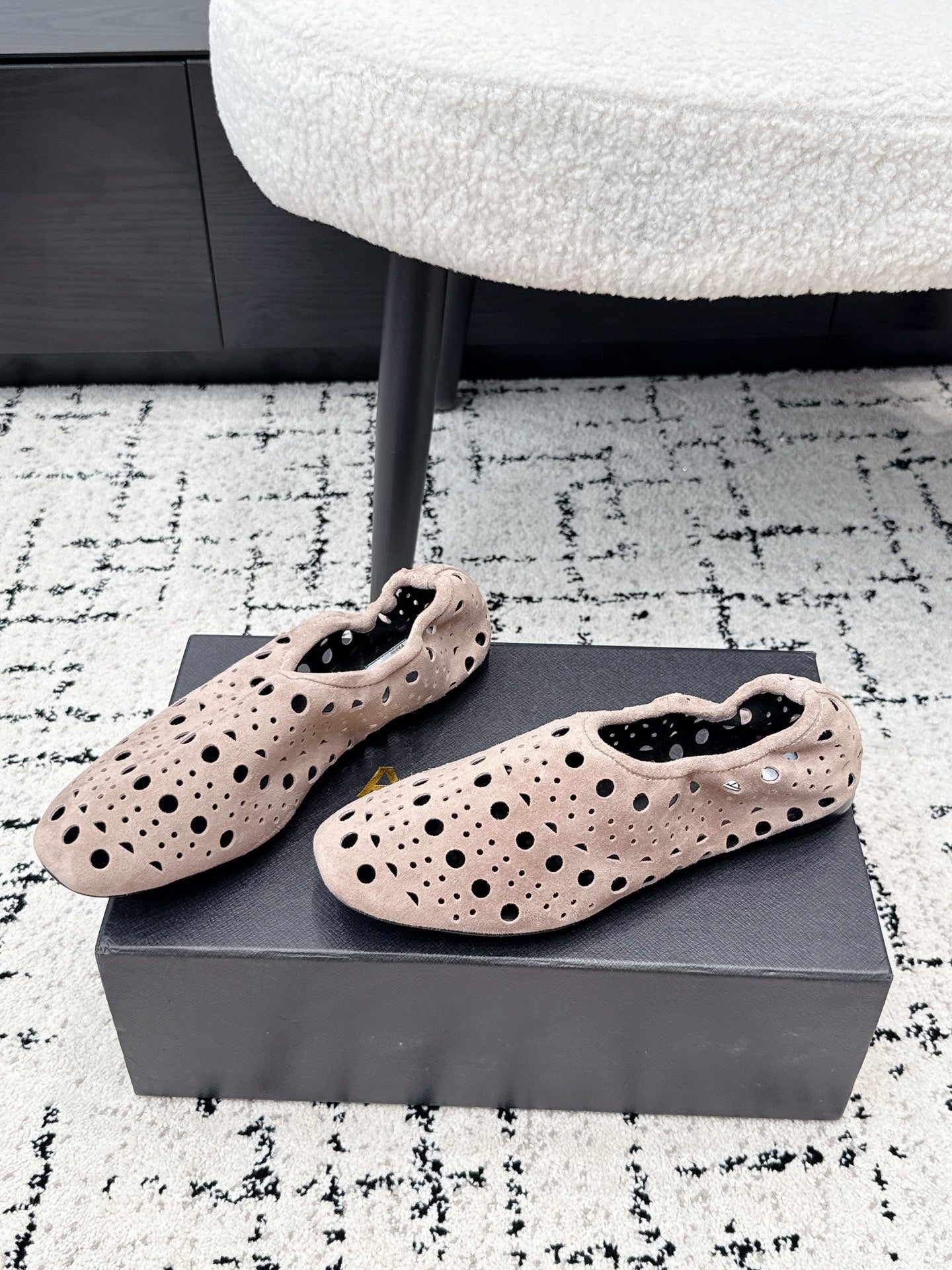 ALAIA 26S FLAT SLIP-ONS IN NUDE PINK SUEDE WITH OPENWORK PATTERN