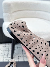 ALAIA 26S FLAT SLIP-ONS IN NUDE PINK SUEDE WITH OPENWORK PATTERN