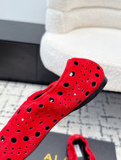 ALAIA 26S FLAT SLIP-ONS IN RED SUEDE WITH OPENWORK PATTERN