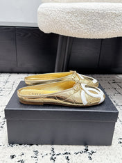 CHANEL 26S FLAT MULES IN GOLD LAMBSKIN