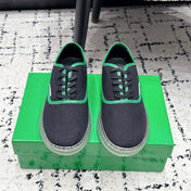 BOTTEGA VENETA 26S SNEAKERS IN BLACK AND GREEN CANVAS