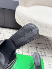 BOTTEGA VENETA 26S TWIST-STRAP HIGH-HEEL SANDALS 90 MM IN BLACK LAMBSKIN