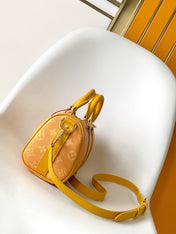 KEEPALL BANDOULIÈRE 25 IN ORANGE MONOGRAM HERITAGE CANVAS