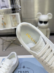 PRADA 26S LACE UP SNEAKERS IN WHITE CALFSKIN