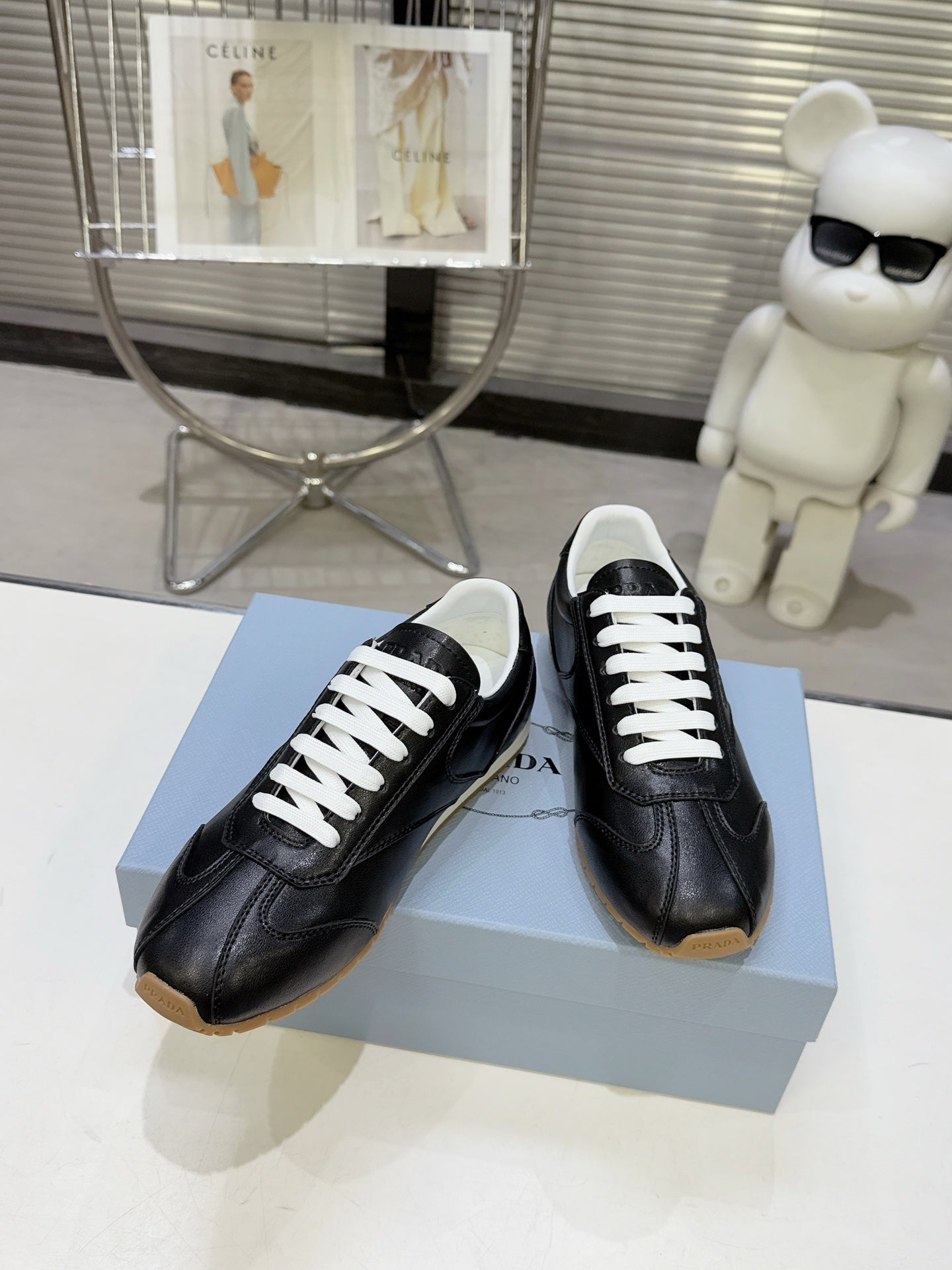 PRADA 26S LACE UP SNEAKERS IN BLACK CALFSKIN
