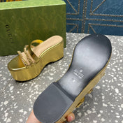 HIGH WEDGE PLATFORM IN GOLD CALFSKIN WITH GOLD HARDWARE