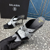 BALMAIN 26S HIGH-HEEL SANDALS 95 MM IN BLACK CALFSKIN AND WHITE FABRIC
