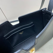 16 STRAP POCHETTE 18 IN BLACK SUPPLE CALFSKIN GOLD HARDWARE