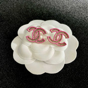 DOUBLE C STUD EARRINGS WITH PINK TRIM AND CENTER STONE