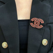 CHANEL 26S DOUBLE C LOGO RED & BLACK STAR ENAMEL BROOCH IN GOLD METAL 629195