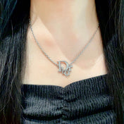 CD 26S CRYSTAL DIOR LOGO PENDANT NECKLACE IN SILVER METAL 631900