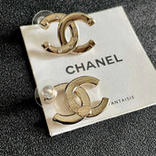 CHANEL 26S DOUBLE C LOGO CRYSTAL STUD EARRINGS IN GOLD METAL 631903