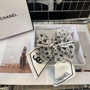 CHANEL 26S HAIR SCRUNCHIE IN WHITE SILK 503073