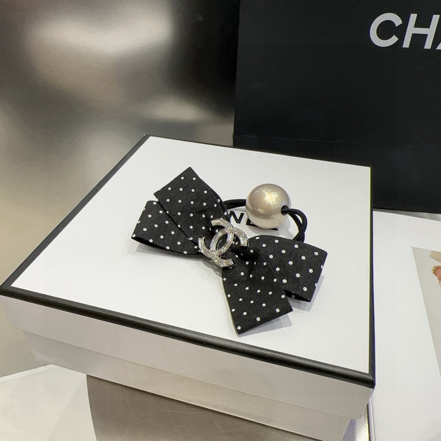 CHANEL 26S BOW HAIR TIE IN BLACK WITH WHITE POLKA DOTS 505302
