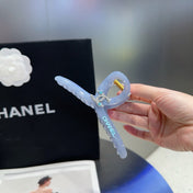 CHANEL 26S HAIR CLIP IN LIGHT BLUE ACETATE 512096