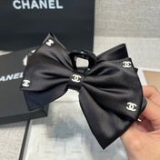 CHANEL 26S BOW HAIR CLIP IN BLACK RIBBON 512128