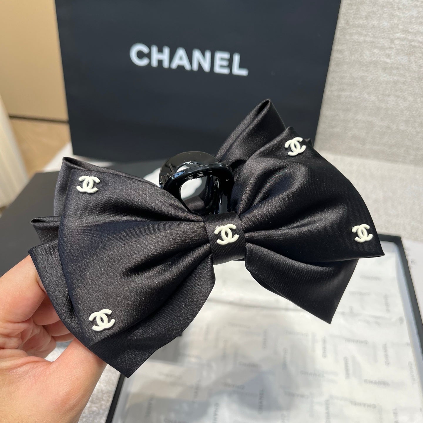 CHANEL 26S BOW HAIR CLIP IN BLACK RIBBON 512128