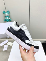 SNEAKER WITH TRIOMPHE IN BLACK AND WHITE CALFSKIN