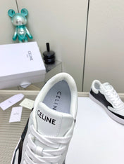 SNEAKER WITH TRIOMPHE IN BLACK AND WHITE CALFSKIN