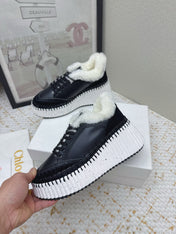 CHLOÉ 26S WEDGE SOLE SNEAKERS IN BLACK CALFSKIN