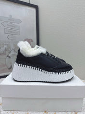 CHLOÉ 26S WEDGE SOLE SNEAKERS IN BLACK CALFSKIN