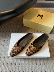 THE ROW 26S SQUARE TOE BACKLESS SLIDES IN BROWN SPOTTED CALF HAIR