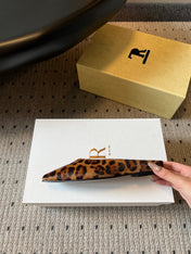 THE ROW 26S SQUARE TOE BACKLESS SLIDES IN BROWN SPOTTED CALF HAIR