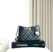 CHANEL 25S HOBO BAG 19.5 CM IN BLACK CALFSKIN WITH GOLD HARDWARE