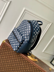 DISCOVERY PM BACKPACK 38 IN NAVY BLUE LAMBSKIN WHITE MONOGRAM LOGO