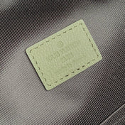 DISCOVERY PM BACKPACK 38 IN OLIVE GREEN MONOGRAM LAMBSKIN