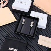MIUMIU 26S CRYSTAL DROP LOGO STUD EARRINGS IN SILVER TONE METAL 626892