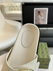 WOMEN'S SLIPPER IN WHITE CALFSKIN WITH GOLD HARDWARE