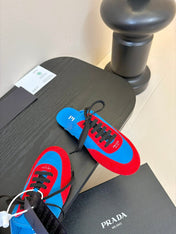 SNEAKER MULES IN BLUE NYLON AND RED SUEDE