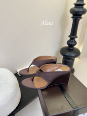 ALAIA WEDGE THONG SANDALS 25S IN BROWN SATIN