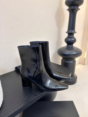 YSL 26S HEELED ANKLE BOOTS IN BLACK SHINY CALFSKIN