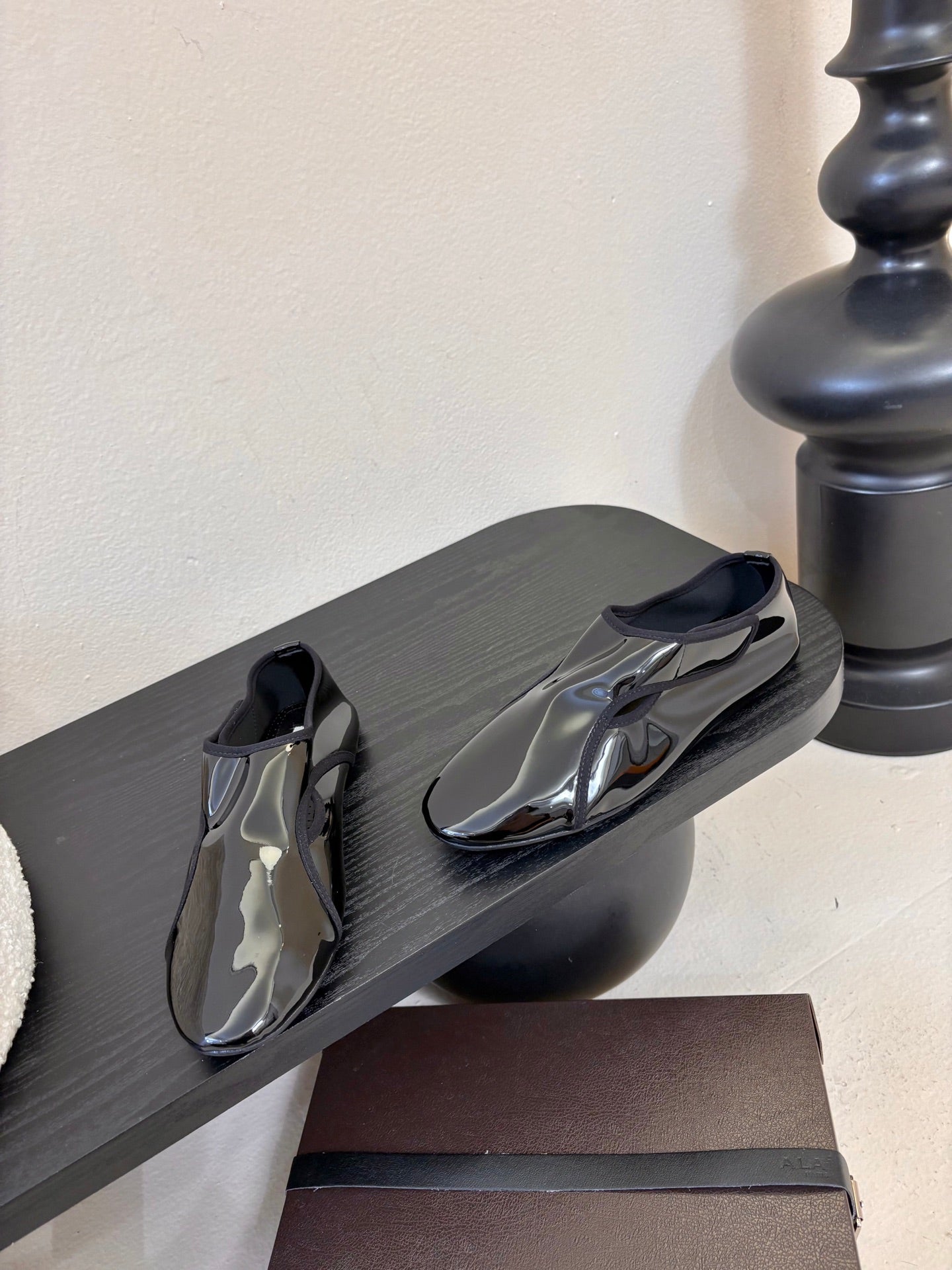 ALAIA 26S FLAT LOAFERS IN BLACK GLOSSY LAMBSKIN