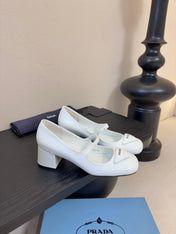 PRADA 26S BLOCK-HEEL MARY JANE IN WHITE PATENT CALFSKIN