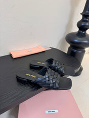 MIUMIU 26S IVETTE WOVEN SLIDE SANDALS IN BLACK CALFSKIN