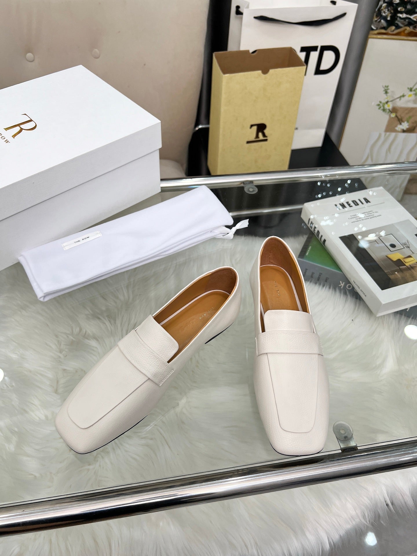 THE ROW 26S PENNY LOAFER FLATS IN IVORY WHITE GRAINED CALFSKIN