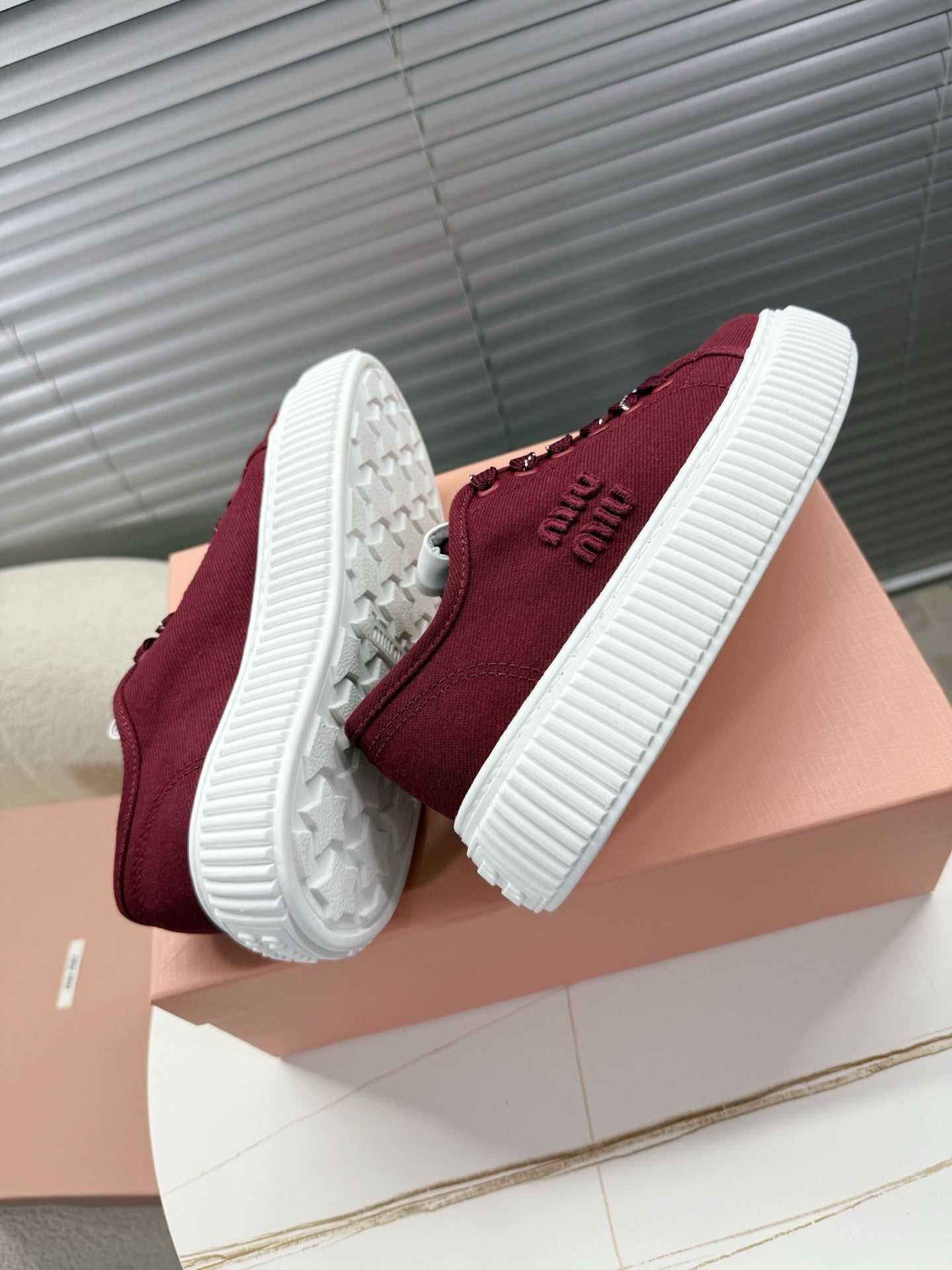 MIUMIU 26S PLATFORM SNEAKERS IN DARK RED CANVAS