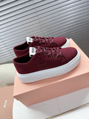 MIUMIU 26S PLATFORM SNEAKERS IN DARK RED CANVAS