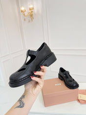 MIUMIU 26S SANDAL 35MM IN BLACK CALFSKIN WITH STYLIZED T-STRING