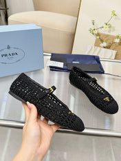 PRADA 26S MARY JANE FLATS IN BLACK WOVEN RAFFIA WITH TRIANGLE LOGO