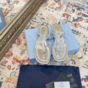 PRADA 26S THONG SANDALS IN SILVER CALFSKIN TRIANGLE LOGO