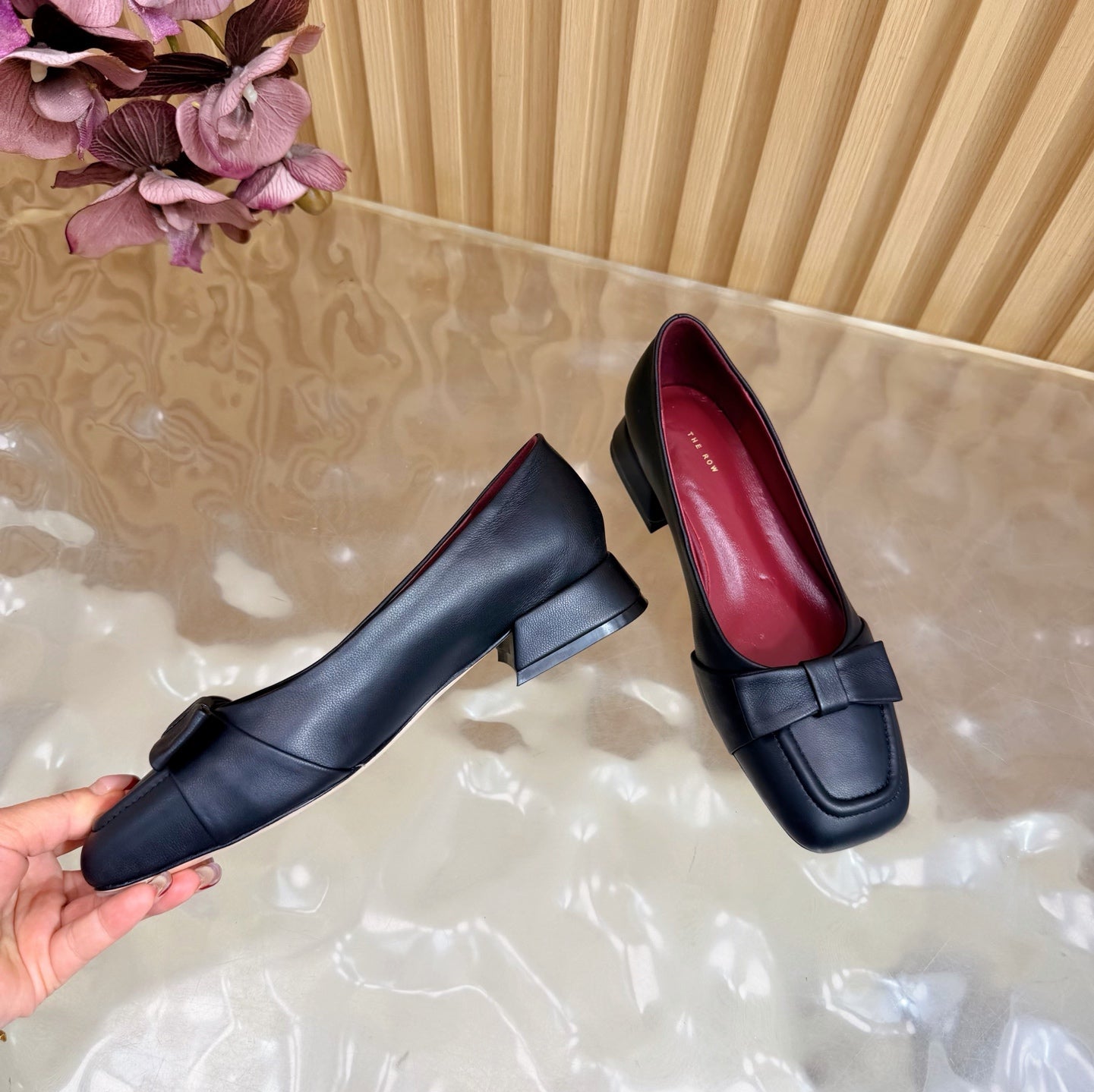 THE ROW 26S SQUARE TOE PUMPS IN BLACK CALFSKIN WITH BOW