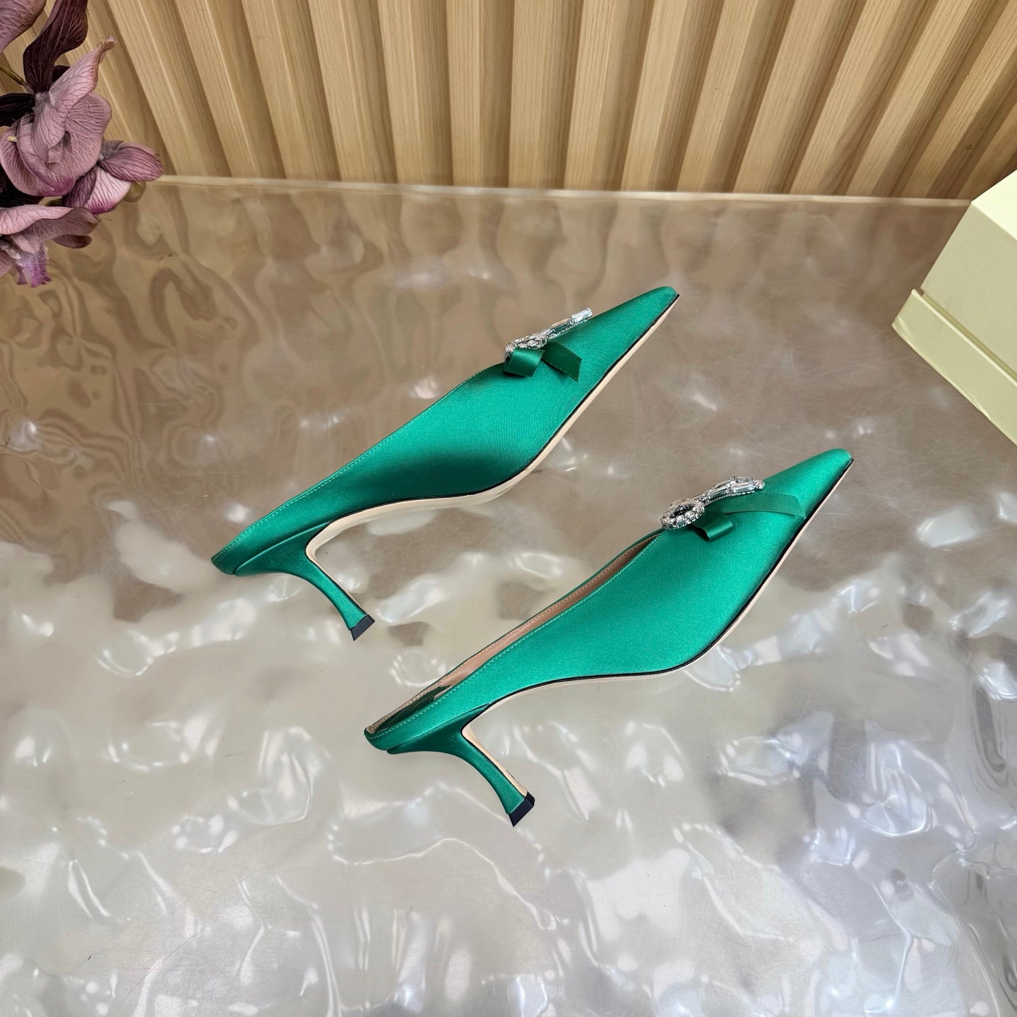 JIMMY CHOO 26S HIGH-HEELED MULES 65 MM IN GREEN SATIN WITH RHINESTONE BOW